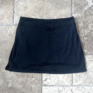 Small black golf/tennis skirt superr soft and comfy with built in shorts